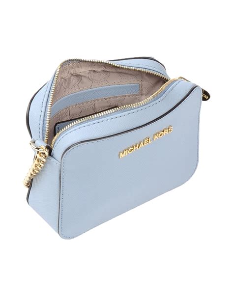 michael kors blue vinyl crossbody|michael kors signature tote strap.